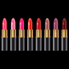Obraz premium lipstick set on black background