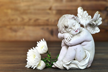 Little angel and flowers