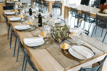 Modern interior table prepared with cutlery