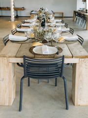 Modern interior table prepared with cutlery