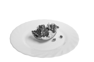 Pomegranate slices and garnet fruit seeds on table. Pomegranate whole. Useful fruit.