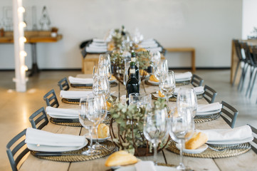 Modern interior table prepared with cutlery