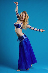 Beautiful belly dancer in motion