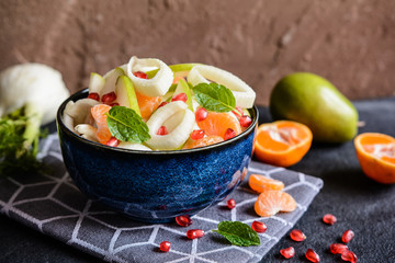 Pear salad with fennel, mandarins and pomegranate
