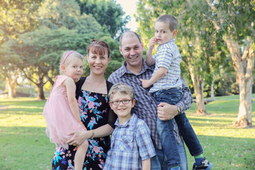 Fototapeta premium Happy family of five in the park