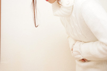 Young Woman suffer from stomachache