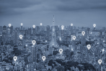 Map pin flat above Tokyo city scape and network connection conce