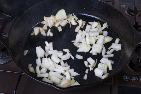 Chopped Brown Onions Frying