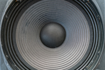 Frontal image audio speaker with undulating membrane.
speaker close up - Music, Volume concept.