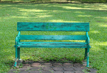 Old wooden bench in the garden park