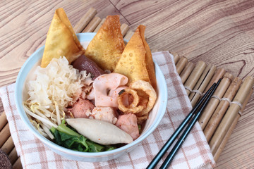 Thai noodle with pink soup called  Yen Ta Fo .