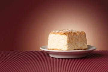 Delicious cake on colorful background with copyspace