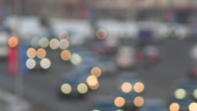 Defocused background - blurred lights of Cars in Traffic