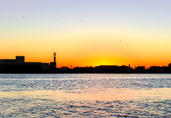 Sunset over the Halifax River harbor in Daytona Beach, FL