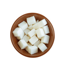 White sugar cubes in bowl on white background