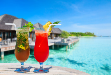 cocktail with blur beach