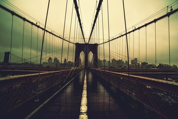 Brooklyn Bridge on stormy rainy day. NYC.