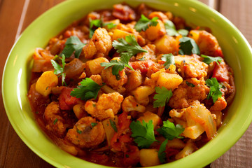 Gobi Aloo is famous Indian curry dish with potatoes and cauliflo