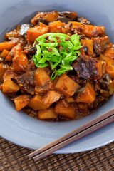 Asian vegetarian meal with potatoes and eggplants. Shot from abo