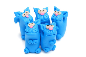 Group of clay toys (cat). Isolated on white background, horizont