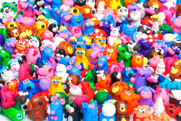 Fototapeta na wymiar Large group of clay toys. Horizontal shot