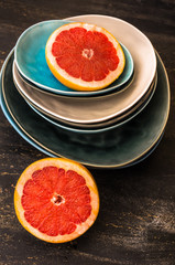 Grapefruit slice on rustic plates