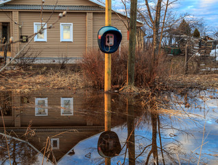 Street in the village, flooding water