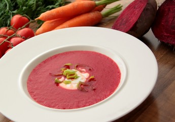 Beet soup with tomatoes and carrots.