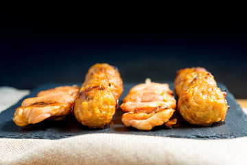 tasty kabobs with vegetables on a slate plate