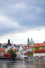 Obraz premium Old Town ancient architecture and river pier in Prague, Czech Re