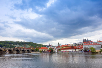 Obraz premium Old Town ancient architecture and river pier in Prague, Czech Re