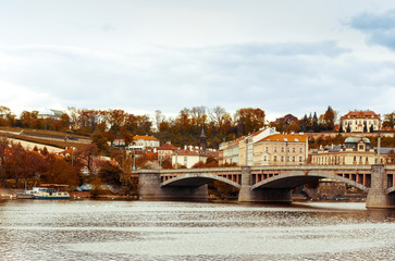 Naklejka premium Old Town ancient architecture and river pier in Prague, Czech Re
