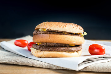 delicious American cheese burger with tomato