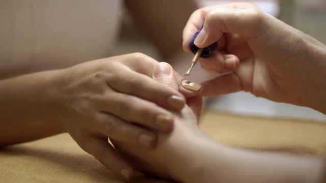 Woman on manicure close-up