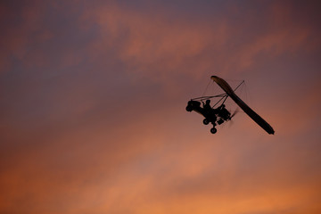 Fototapeta na wymiar Hang-glider with pilot in sky