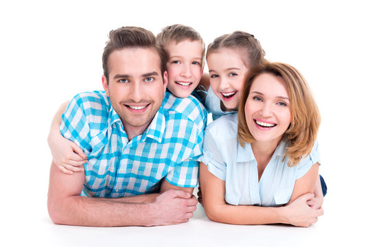 Caucasian happy smiling young family with two children