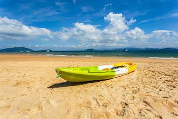 Canoe on the beach at sunshine day