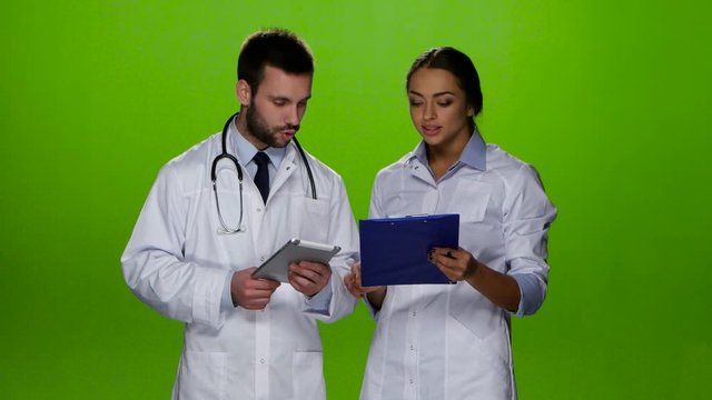 Woman doctor to prescribe medication for the treatment of patients