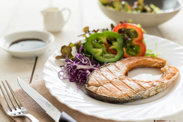 Grilled Teriyaki salmon steak with vegetables