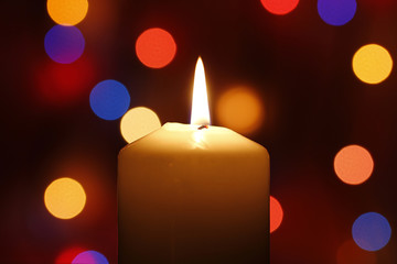 Christmas candle, with bokeh spot lights