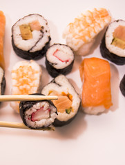 Pieces of sushi on white background