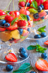 Fruit salad on white table