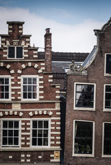 Fototapeta na wymiar Classic crooked house in Amsterdam