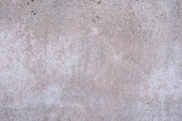 Wall fragment with scratches and cracks