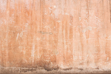 old plaster wall with stains from water