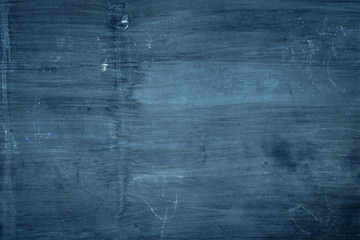 dark blue painted plaster surface