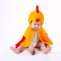 little funny boy in chicken costume