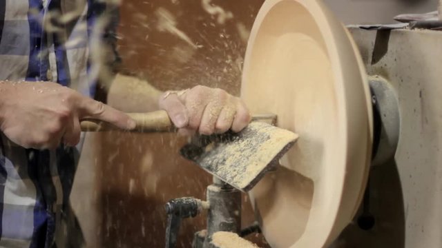 Foot operated spring pole wood lathe.