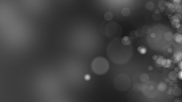 Dark gray background. Abstract glowing bokeh circles or sparks. 3D rendering
