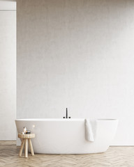 Bathtub with a chair and a white wall